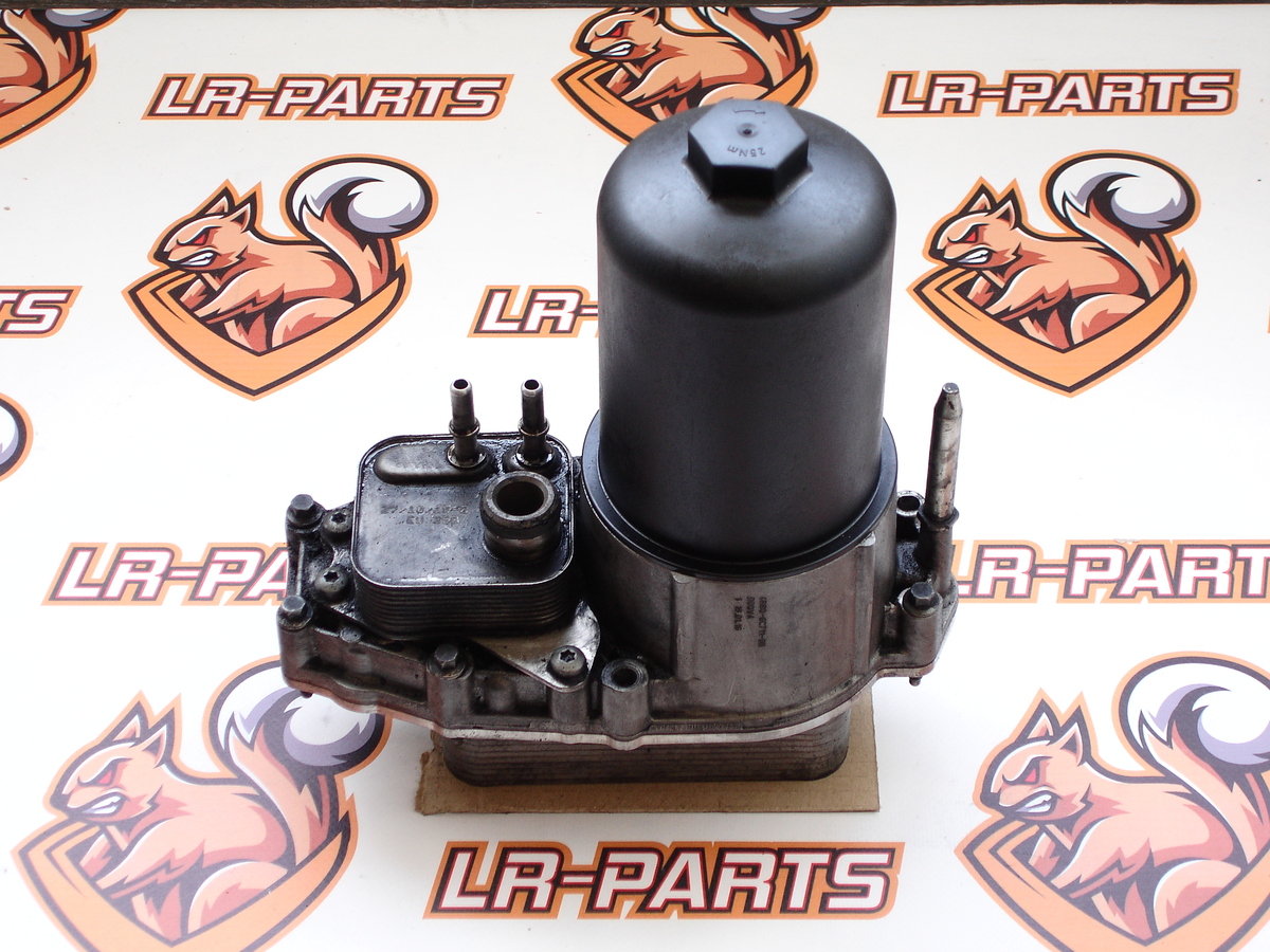 LR009570 Корпус масляного фільтра з теплообмінником 2.7 TD RANGE ROVER SPORT L320 2005-20